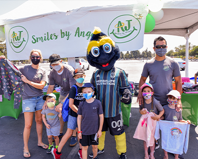 Family-Kinecta-Mascot-and-Backpacks.jpg Family-Kinecta-Mascot-and-Backpacks.jpg