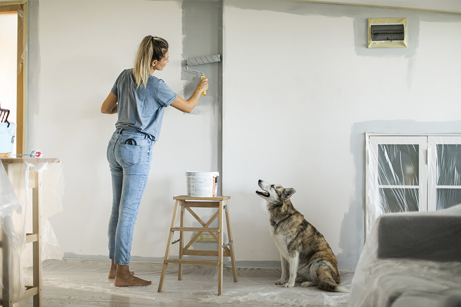 Woman painting room