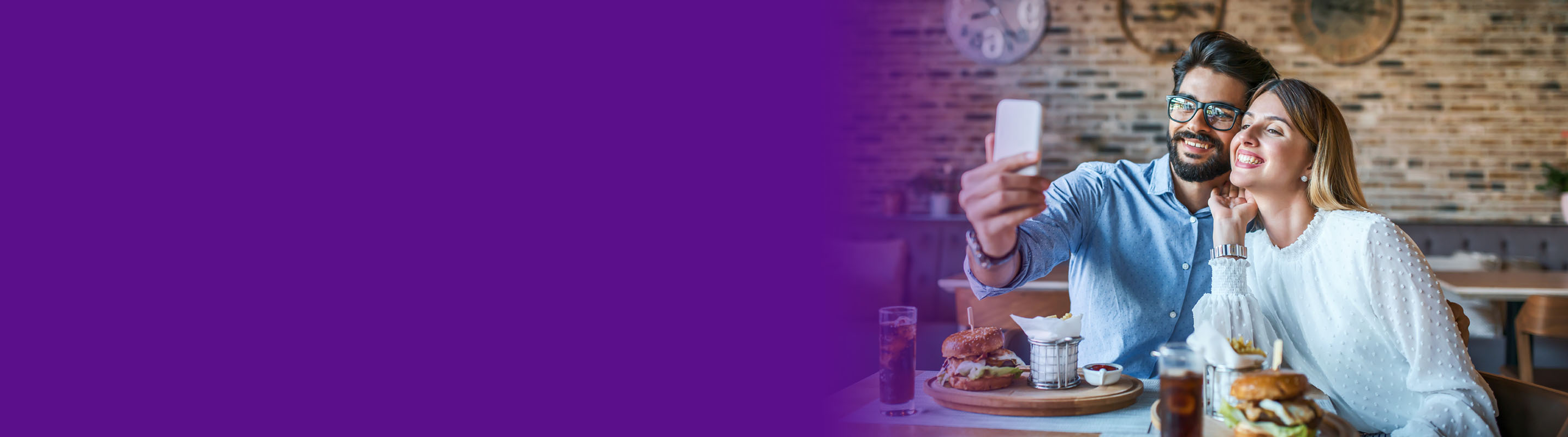 couple taking a photo at lunch