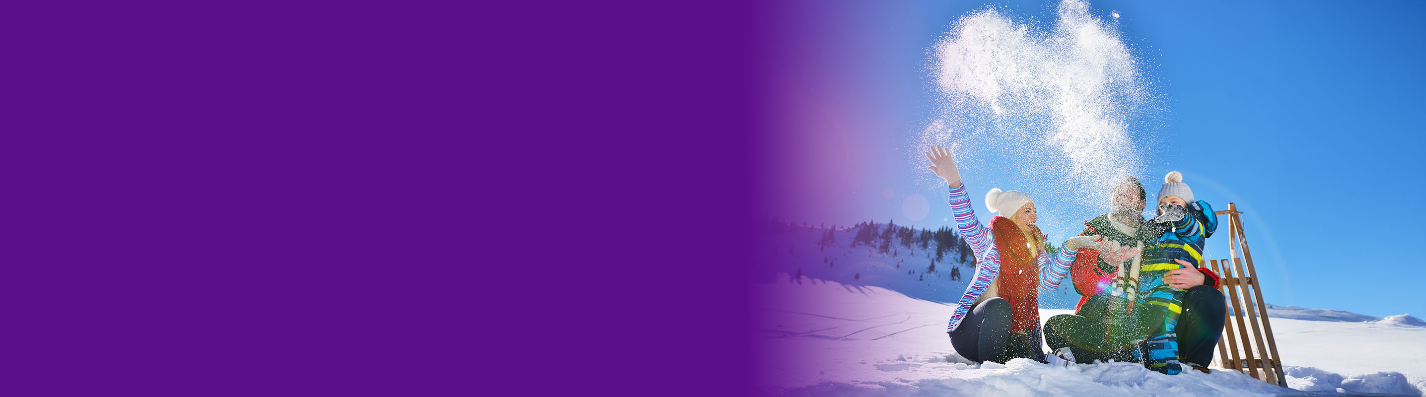 women standing on a hill top overlooking a valley