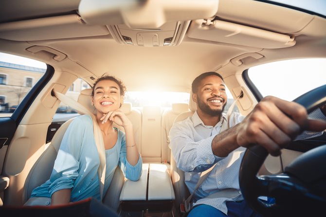 Couple Driving Car